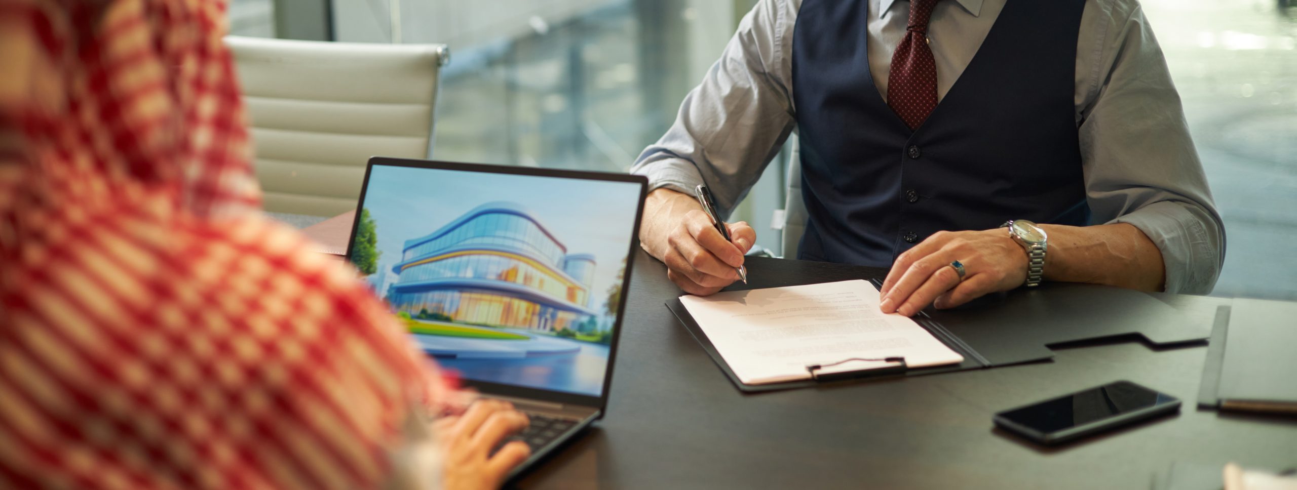 Businessman Signing Agreement with Building Construction Company