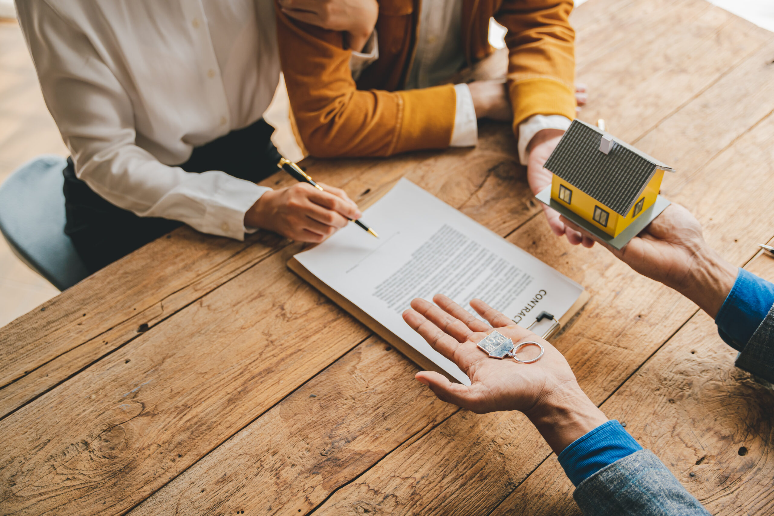 Real estate agents deliver replica homes to couples. Mortgage ag The Complete Property Conveyancing Checklist